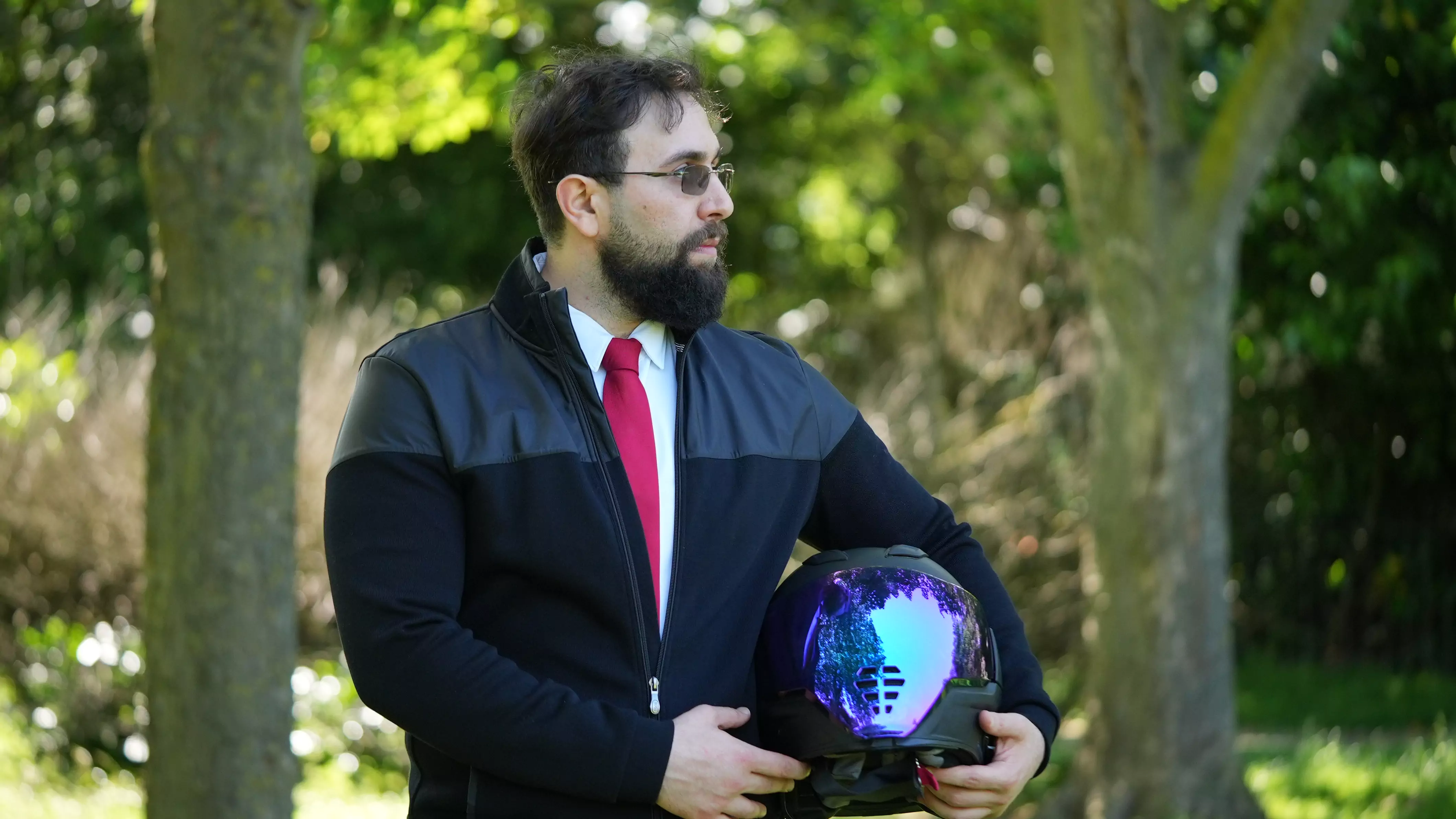 Will James, CEO of OW London Electrician, expert in AI and Robotics, standing outdoors with a helmet